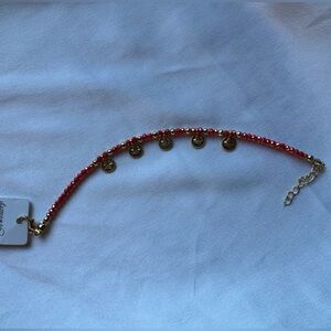 Red Beaded Bracelet with Gold Accents